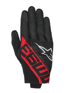 Gants Alpinestars MM93 Reef V2, gants de moto, noir et rouge vif, avec des graphismes 93 rouges et un logo étoile blanc, design signature de Marc Márquez, construction textile à manchette courte