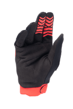Gants Alpinestars Honda Full Bore, gants de motocross, rouge vif et noir, vue de la paume en suède synthétique avec motifs d'adhérence en silicone rouge sur le bout des doigts, poignet extensible rouge, conception durable pour le pilotage tout-terrain
