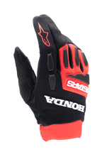 Gants Alpinestars Honda Full Bore, gants de motocross, rouge vif et noir, marquage Honda et Astars blanc, protections de phalanges en TPR, construction en textile extensible respirant, logo étoile rouge sur le doigt, design de course tout-terrain sportif