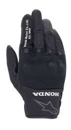 Alpinestars Honda Copper Glove, gants de moto urbains noirs, construction en mesh texturé, texte blanc "Honda Motor Co. Ltd. Est. 1948" sur l'index, logo "HONDA" et étoile Alpinestars au poignet, protection rigide des articulations, équipement léger pour la route