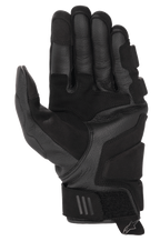 Gants Alpinestars Phenom Leather Air, noir, vue côté paume, avec construction en cuir de chèvre premium, zones de préhension renforcées et fermeture de poignet ajustable par Velcro.
