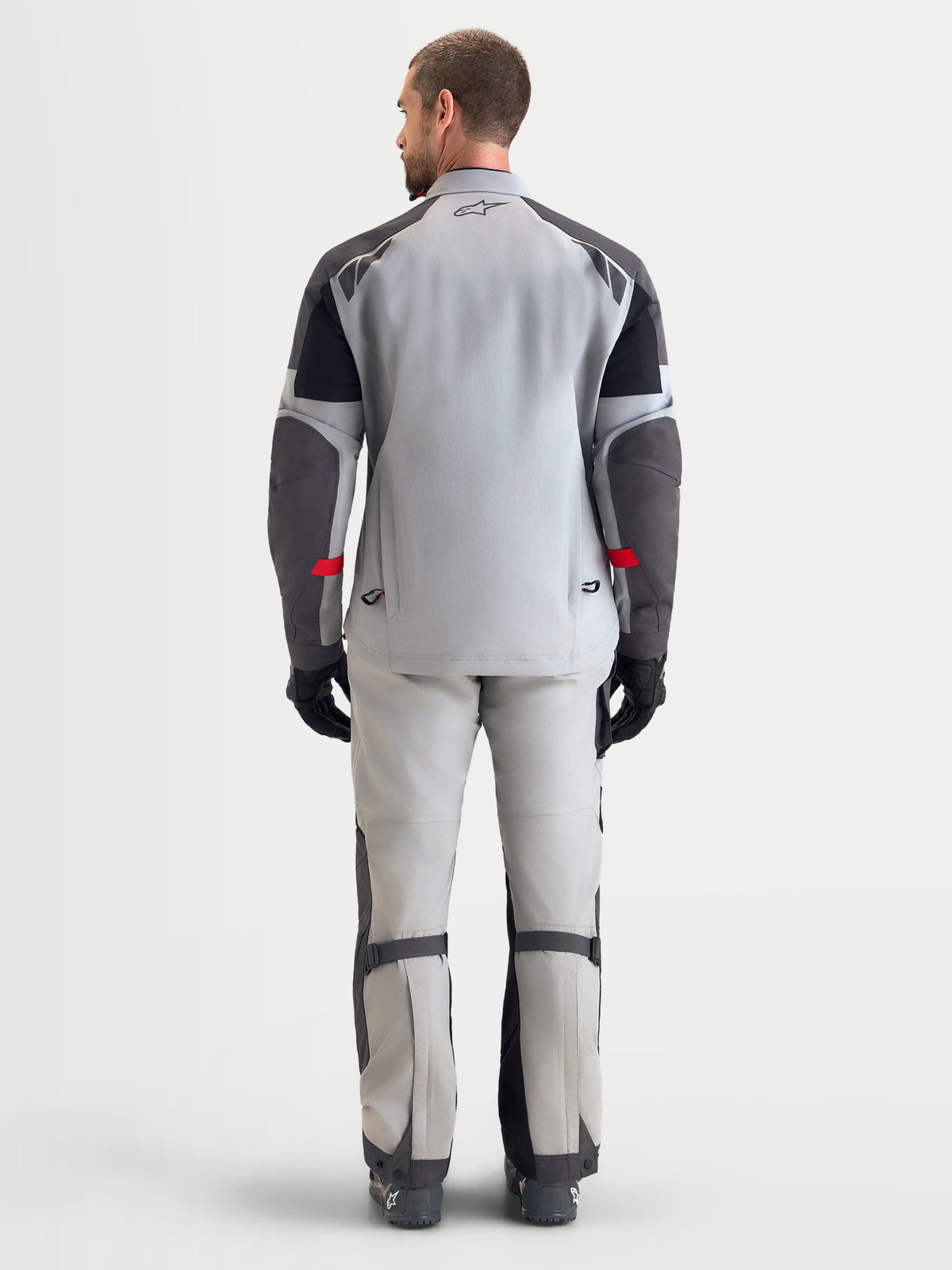 Alpinestars Arenis Gore-Tex Veste, veste de moto adventure pour homme en gris, gris foncé et noir, vue de dos montrant la construction textile imperméable et les évents d'extraction arrière intégrés