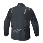 Veste Alpinestars ST-7 2L GORE-TEX, vue arrière, noir et gris foncé, avec panneaux réfléchissants aux épaules, logo étoile Alpinestars argenté dans le bas du dos et sangles de réglage à la taille, équipement de moto adventure touring