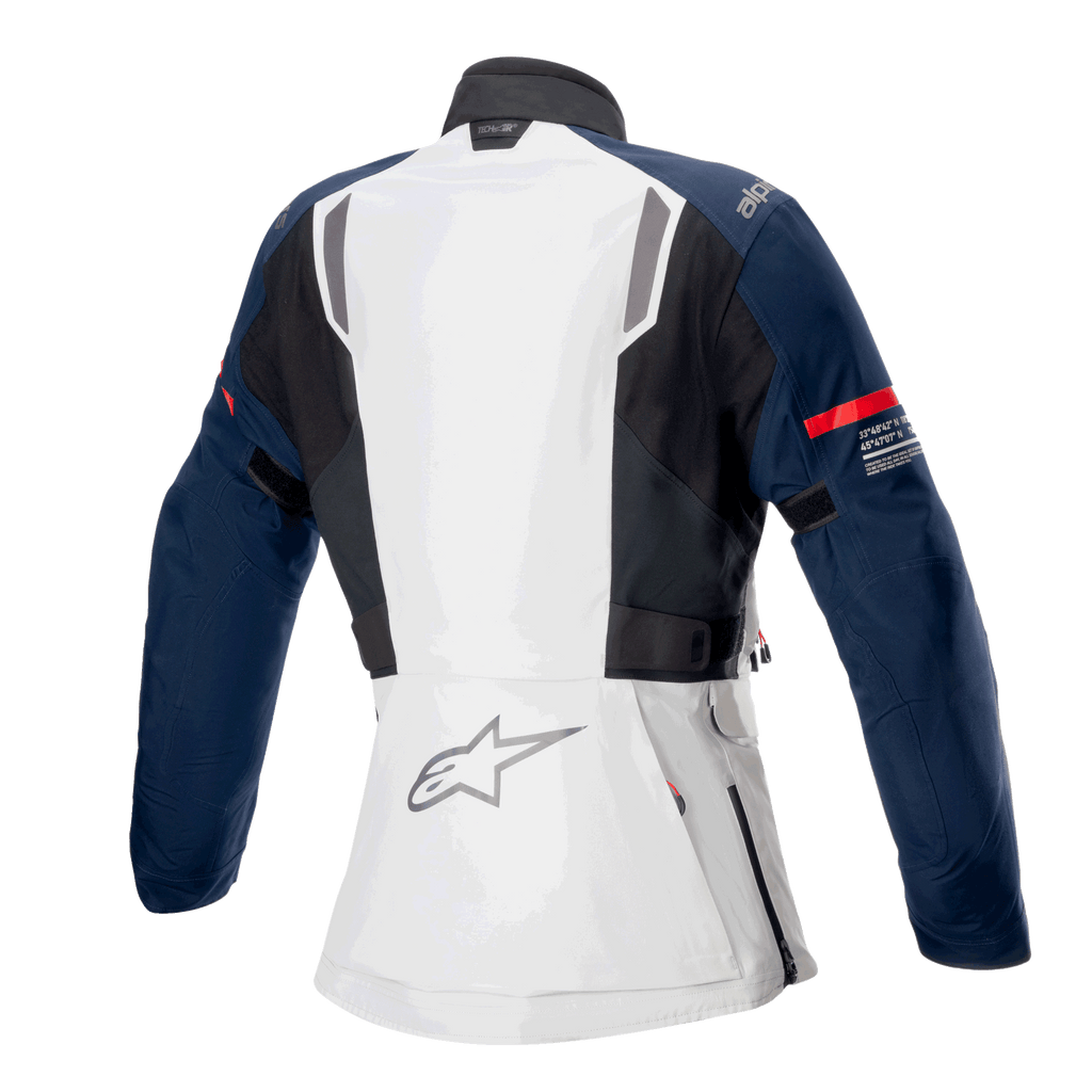 Veste Alpinestars Stella ST-7 2L GORE-TEX pour femme, vue de dos, gris glacé, bleu foncé et noir, avec bande rouge sur la manche et logo Alpinestars, équipement de moto d'aventure touring