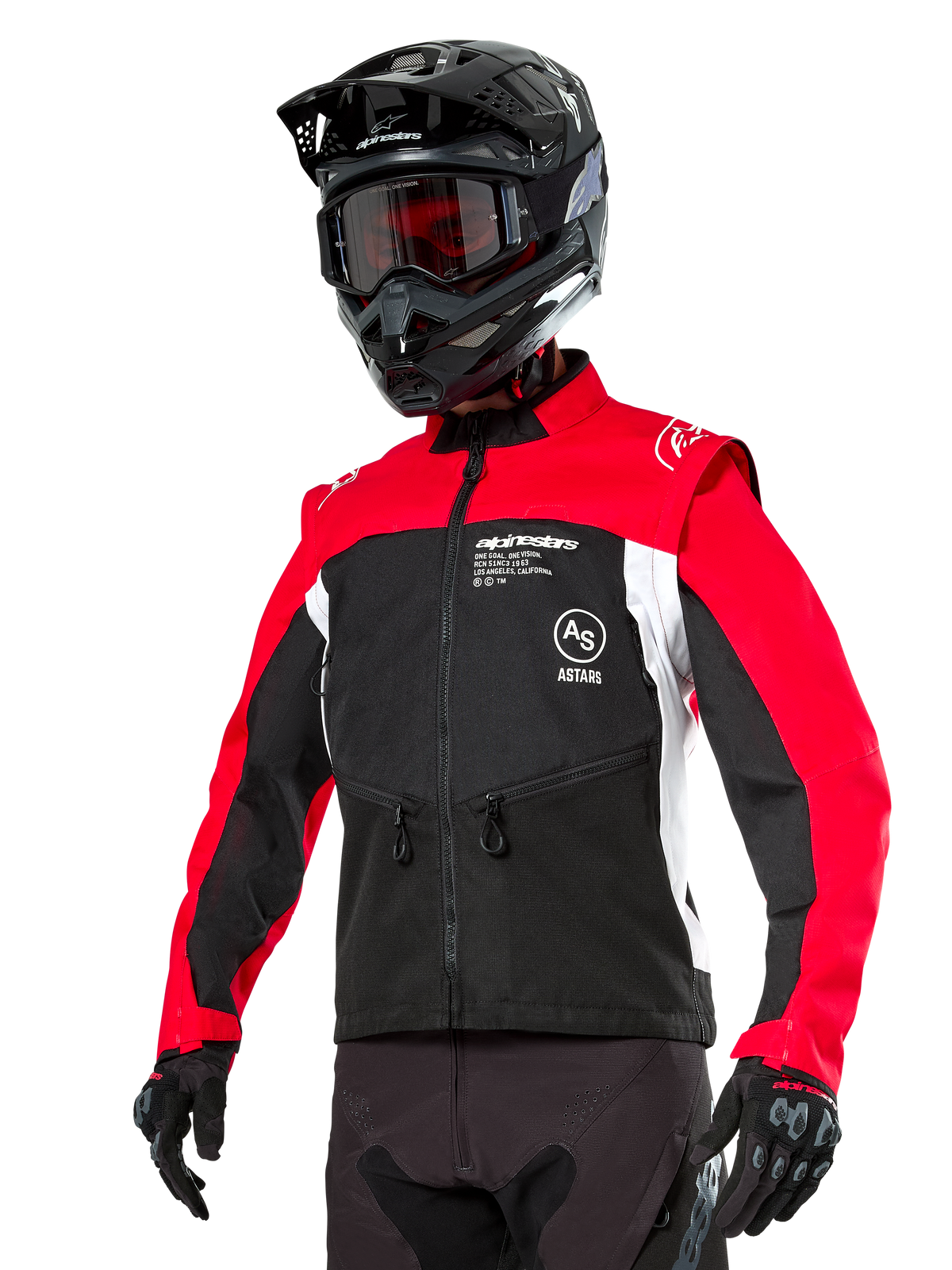Veste Alpinestars Pro-Dura, veste de moto enduro tout-terrain, noir avec contrastes rouge vif et blanc, portée par un pilote avec un casque et des lunettes noirs, dotée de poches avant zippées et du logo Alpinestars, construction textile durable pour le trail.