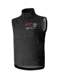 Alpinestars Techstar Softshell Vest, Black Sleeveless Motocross Vest, high collar with front zipper, featuring red star logo with "ASTARS" and "ONE GOAL. ONE VISION." chest branding, lightweight windproof softshell fabric with light gray interior lining, designed for off-road riding