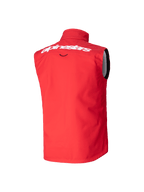 Gilet Softshell Techstar Junior Alpinestars, gilet de motocross, rouge éclatant, vue arrière avec grand lettrage Alpinestars blanc sur le haut du dos, design softshell sans manches avec col montant pour une protection contre le vent.