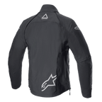 Veste Alpinestars Techdura, Noir Reflex, vue arrière de la veste de moto tout-terrain en textile, logos Alpinestars réfléchissants sur le bas du dos et la nuque, conception robuste pour l'enduro et l'aventure