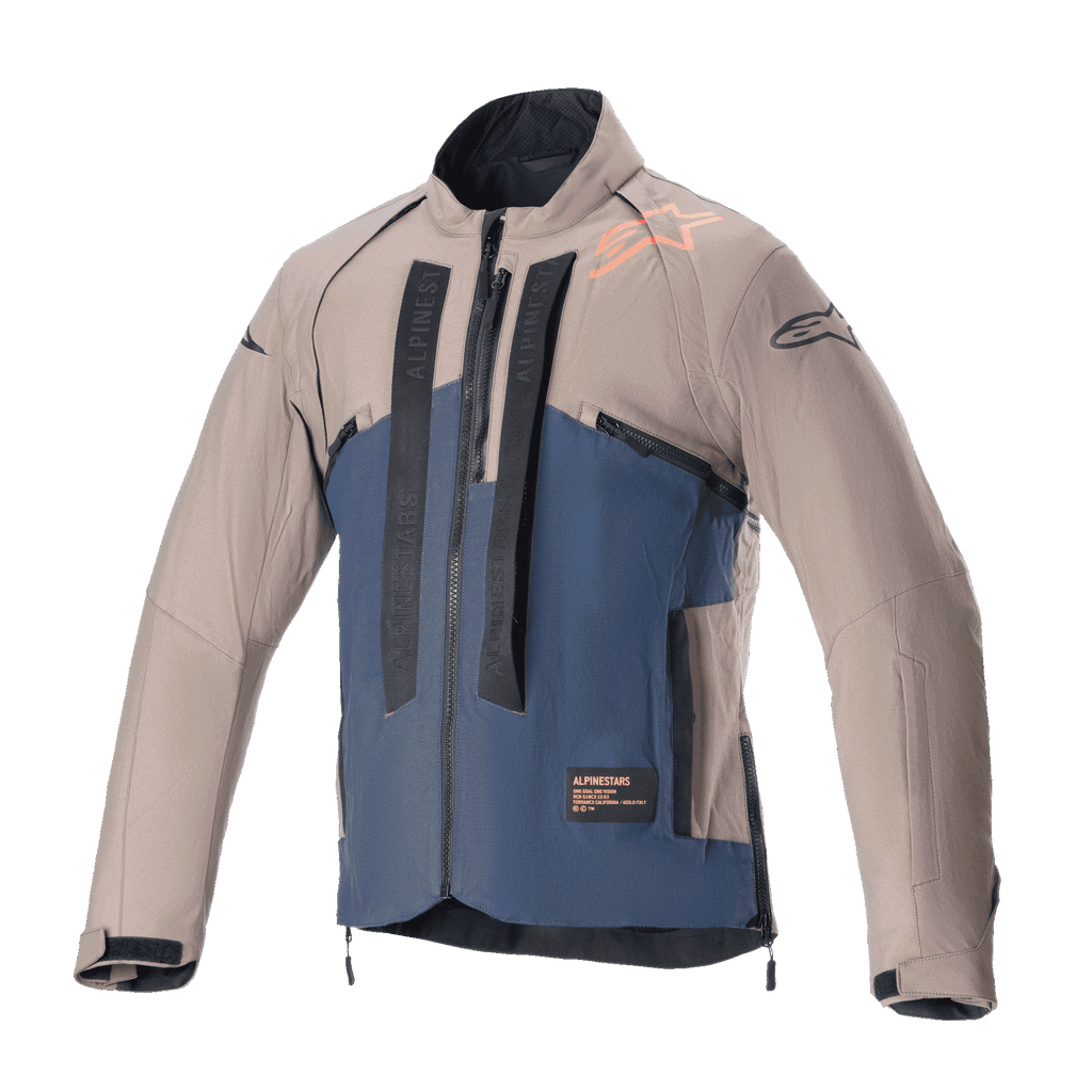 Veste Alpinestars Techdura, veste de moto tout-terrain, Falcon Brown et Night Navy, vue de face, construction bicolore avec marquage Alpinestars vertical noir, logo orange sur l'épaule, col haut et fermeture éclair frontale, vêtement technique pour l'enduro et le pilotage d'aventure.