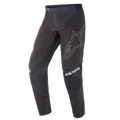 Alpinestars Techstar Phantom Pants 2021, pantalon de motocross, noir avec accents blancs, grand logo étoile en contour sur la cuisse, marquage ASTARS aux genoux, tissu technique rip-stop avec zones perforées et construction de genou 3D Babel pour la performance tout-terrain