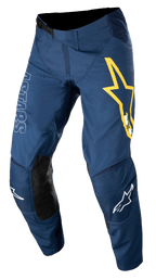 Alpinestars Techstar Phantom, pantalon de motocross, bleu foncé avec accents jaunes et blancs, panneaux de genoux en cuir noir, grand logo étoile jaune sur la cuisse, marquage ASTARS blanc, tissu rip-stop extensible durable pour le tout-terrain