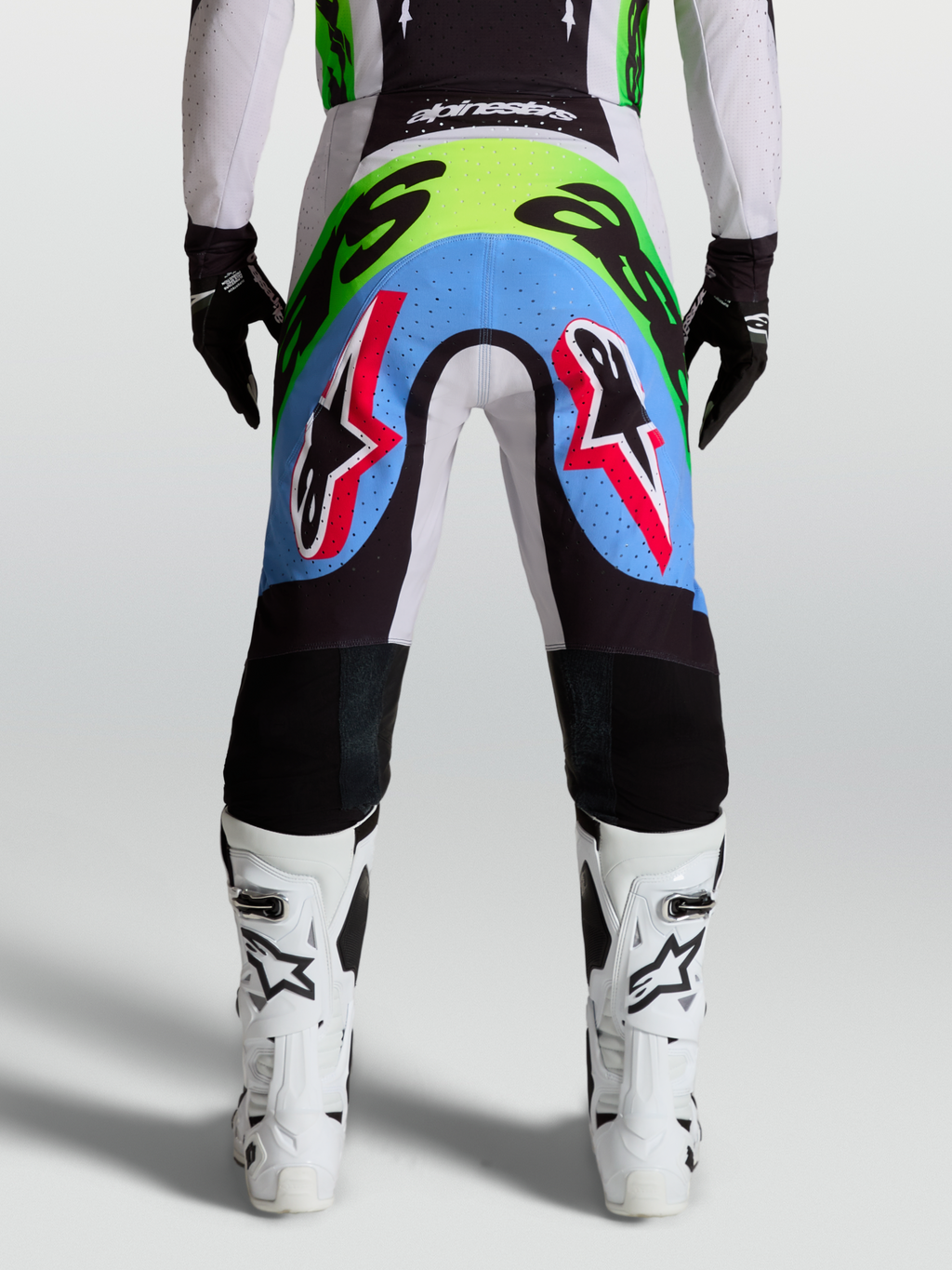 Alpinestars pantalon Supertech Dyna, motocross pour homme, vert fluo et lilas clair, vue arrière, panneaux perforés