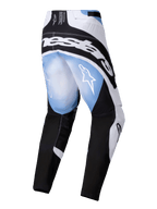 Alpinestars Techstar Melt Pants 2025, pantalon de motocross, noir, blanc et bleu avec effet de dégradé, vue arrière montrant un grand logo blanc sur les hanches et des logos étoiles sur les cuisses, design sportif pour la course tout-terrain