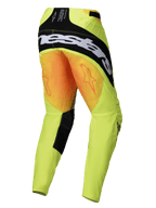 Alpinestars Techstar Melt Pants 2025, pantalon de motocross, jaune et noir, vue arrière montrant un grand logo Alpinestars noir sur l'assise et des graphismes d'étoiles orange sur les cuisses, tissu technique jaune fluo avec panneaux intérieurs noirs.