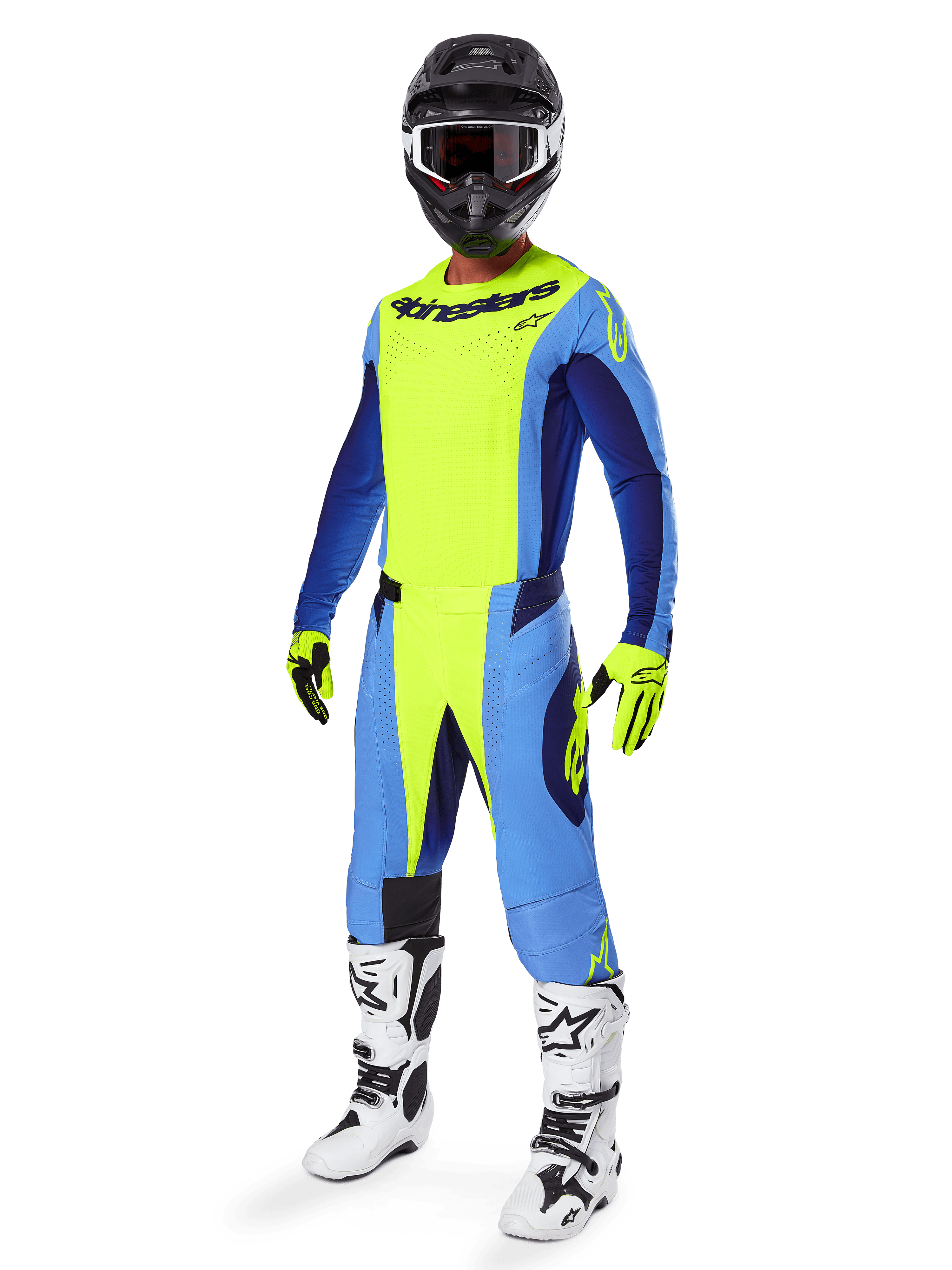 Alpinestars Techstar Melt Pants 2025, pantalon de motocross, jaune fluo et bleu, porté dans le cadre d'une tenue de course complète avec maillot assorti, gants jaunes et noirs, bottes blanches et noires, et casque noir avec lunettes blanches, équipement de performance tout-terrain coordonné