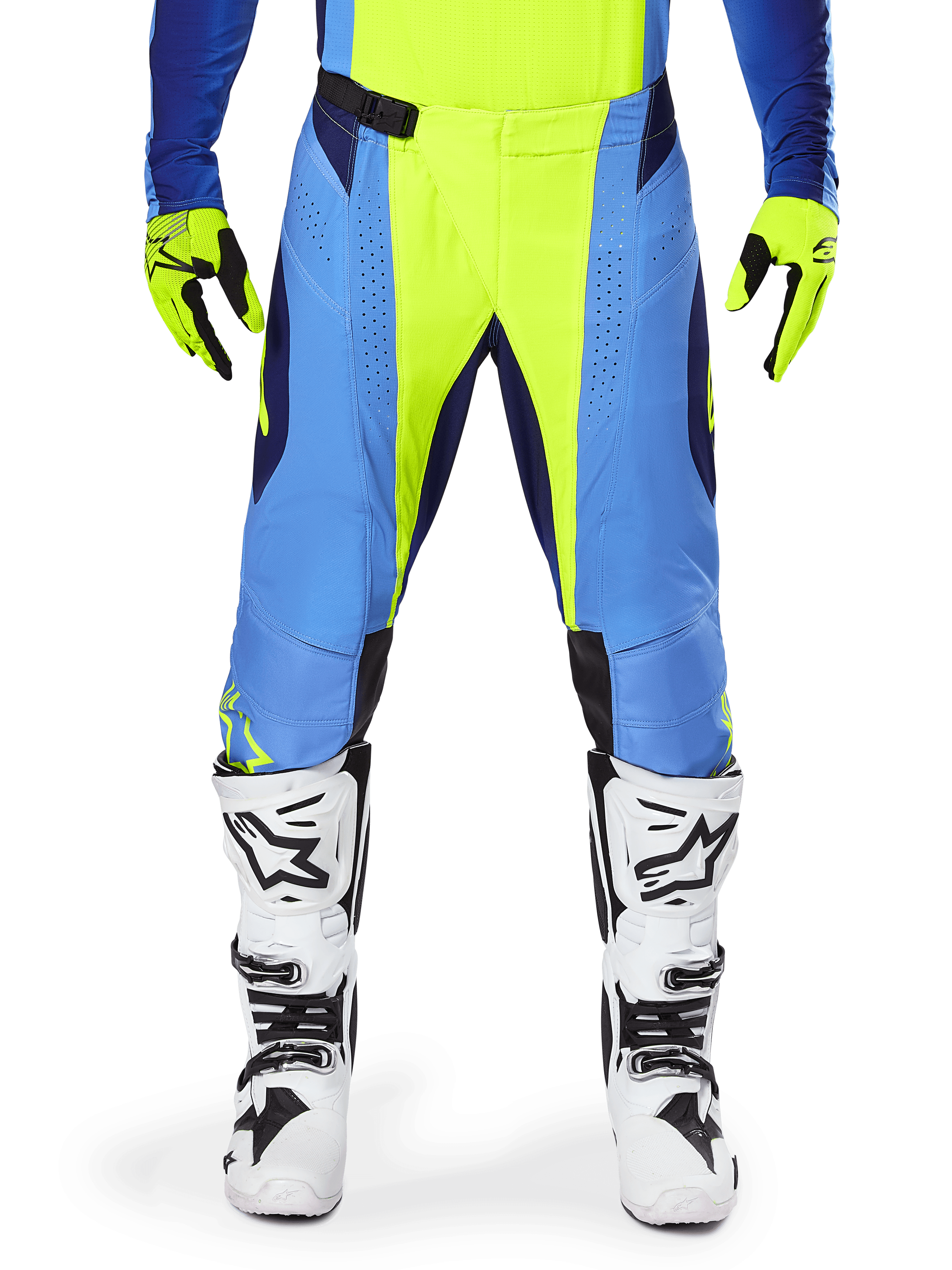 Alpinestars 2025 Techstar Melt Pants, pantalon de motocross, jaune fluo et bleu, porté avec des gants assortis et des bottes blanches, avec empiècements bleus et accents jaune fluo, design axé sur la performance pour la course tout-terrain