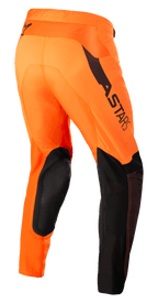Alpinestars Supertech Blaze Pants, Motocross Pants, Orange and Black with Yellow Fluo, rear three-quarter view showing black leather knee reinforcements, ASTARS branding on the thigh, and breathable mesh panels, designed for professional-level dirt riding