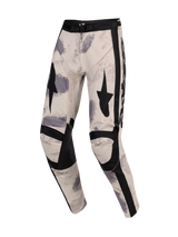 Alpinestars 2026 Racer Lahnd Pants, Motocross Pants, Sand Camo, featuring off-white base with gray and black brushstroke patterns, black star graphics on thighs, reinforced black knee panels, and adjustable waist buckle, ergonomic off-road racing design