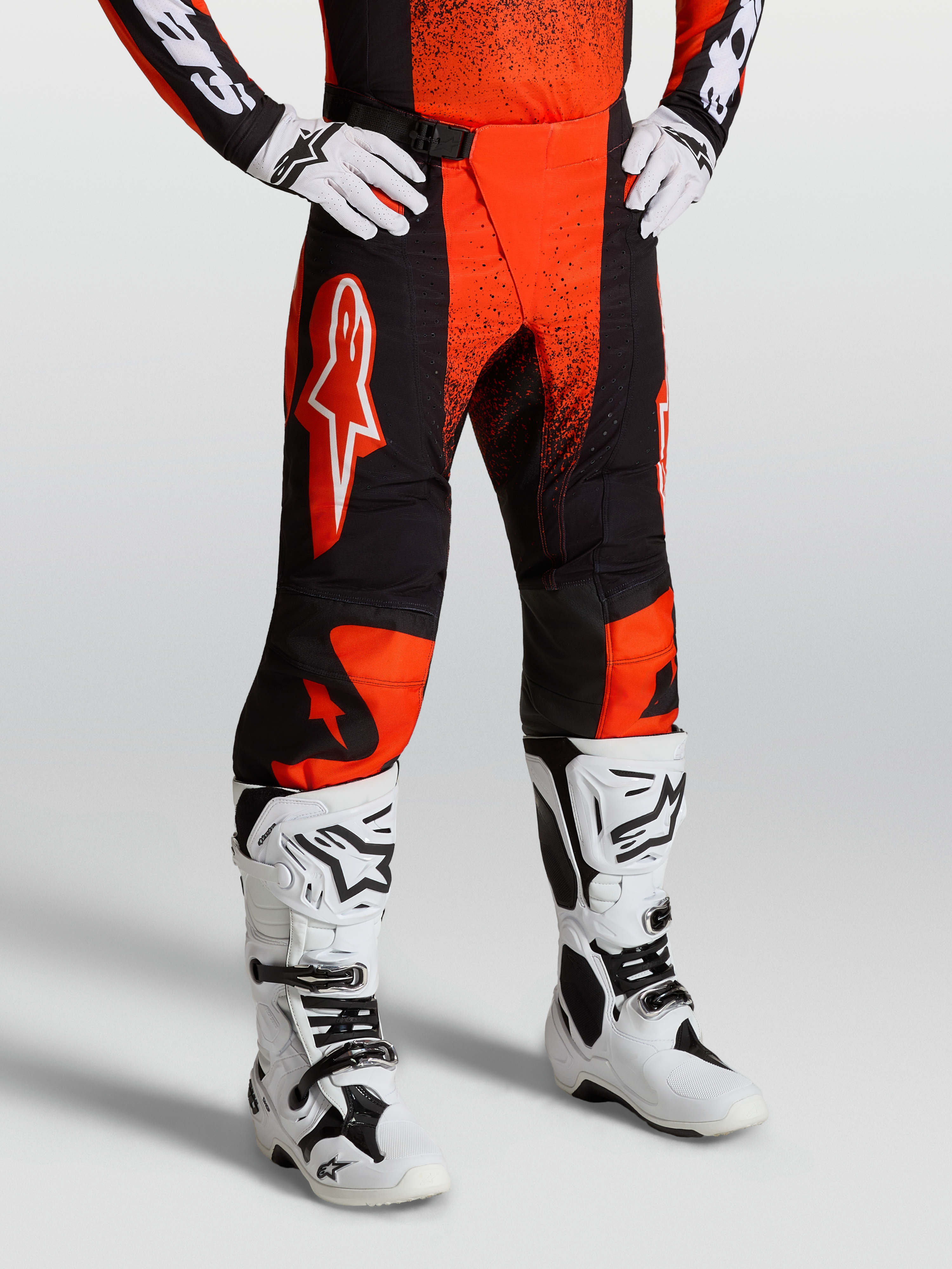 Alpinestars Techstar Swan Pants, Motocross Racing Pants for Men, Cardinal Red and Black, durable ripstop with 4-way stretch panels.