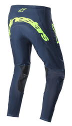 Alpinestars 2023 Supertech Bruin Pants, pantalon de motocross, Bleu Marine Nuit et Jaune Fluo, vue arrière présentant un large marquage Alpinestars jaune fluo sur l'assise, des zones de ventilation perforées et des renforts noirs à l'intérieur des jambes.
