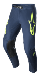 Alpinestars 2023 Supertech Bruin Pants, pantalon de motocross, bleu marine et jaune fluo, doté de panneaux de genoux renforcés noirs, d'une ventilation perforée et d'une boucle de taille magnétique ajustable, design de course durable