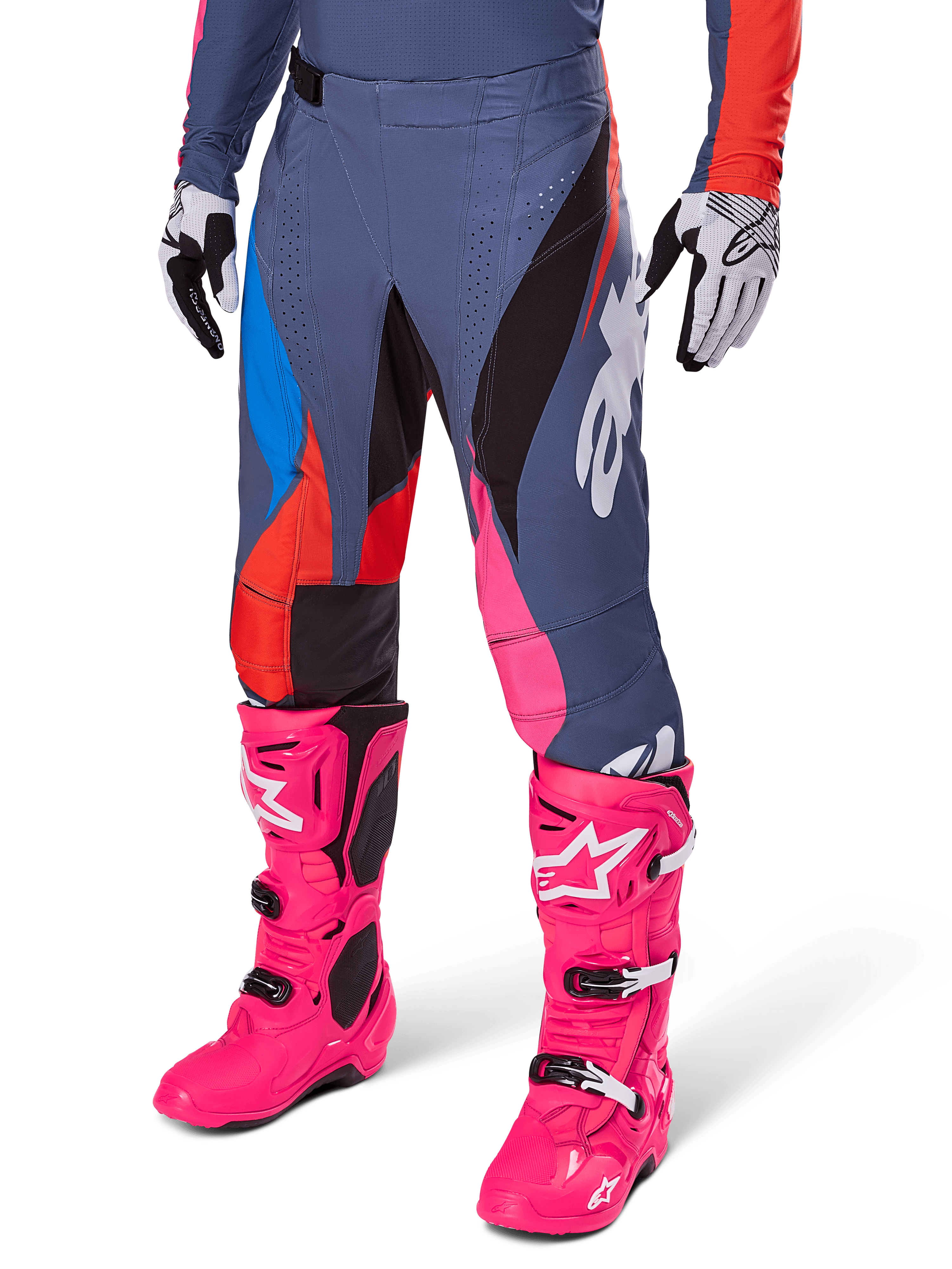 Alpinestars 2025 Techstar Dreem Pants, Motocross Pants, Dark Gray with Blue Red and Pink Panels, White Graphics, worn with bright pink boots and black and white gloves, bold high-visibility design