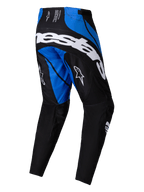 Alpinestars Techstar Dreem Pants 2025, pantalon de motocross, noir et bleu, avec lettrage Alpinestars blanc imposant à l'arrière, empiècements bleus contrastés sur le haut du dos et l'intérieur des jambes, logos A-star blancs sur les cuisses, design technique pour la course tout-terrain