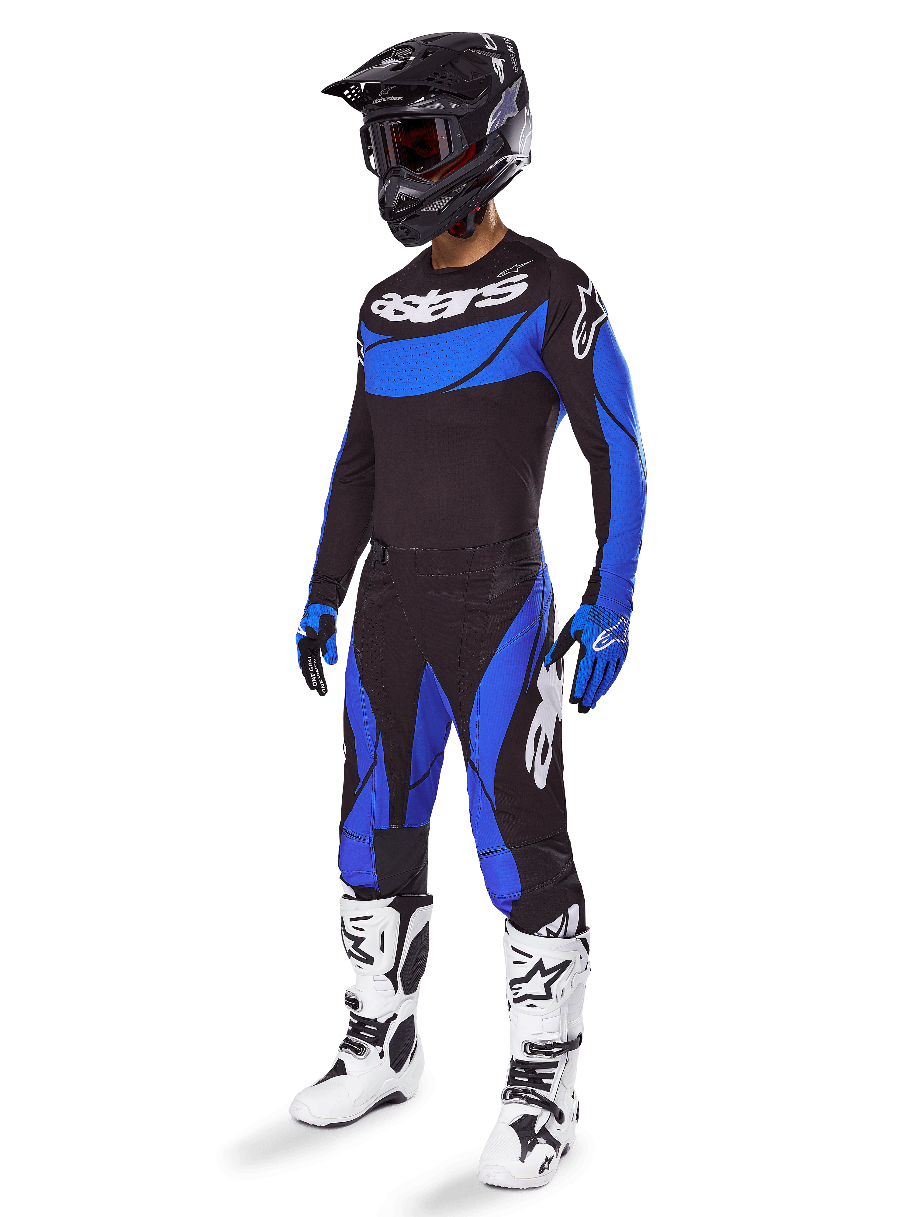 Alpinestars 2025 Techstar Dreem Gear Set, équipement de motocross noir et bleu, incluant un maillot et un pantalon avec logos blancs, porté avec un casque noir, des gants bleus et noirs et des bottes blanches et noires, tenue de course coordonnée pour la performance tout-terrain.