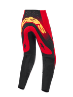 Alpinestars 2026 Supertech Scenz Pants, Motocross Pants, Red Black and Yellow, rear view featuring a large yellow logo across the seat, red panels with black star graphics, laser-cut perforations at the waist, and black reinforced lower leg panels.