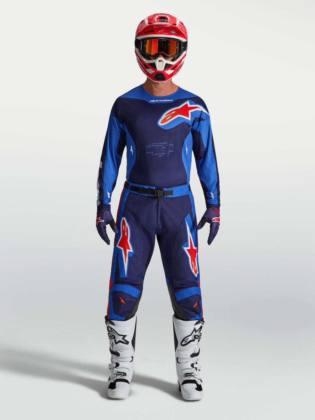 Pantalon Racer Hunt Alpinestars, pantalon de motocross bleu et rouge pour homme, en poly-tissu durable et extensible.