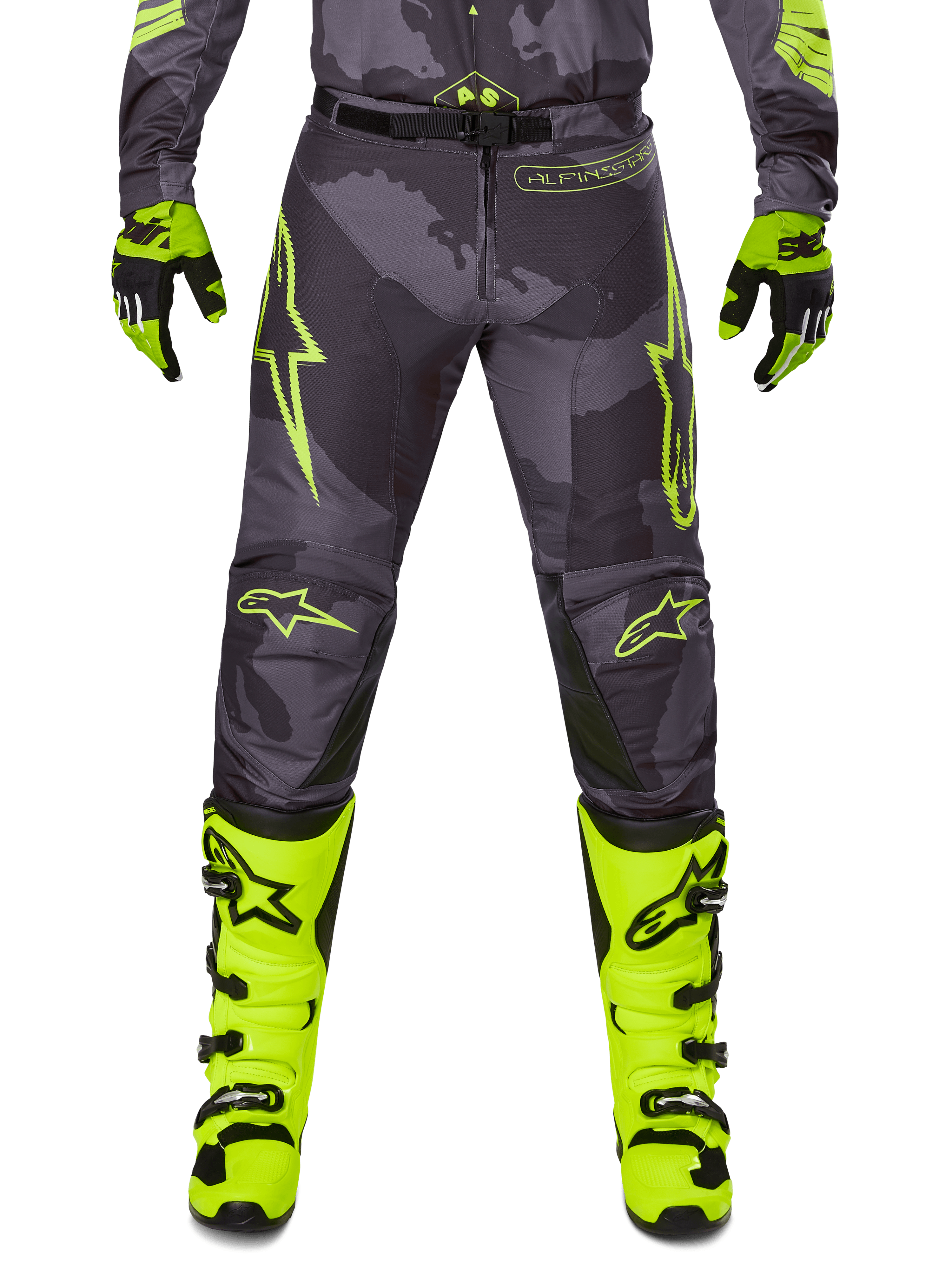 Alpinestars Racer Hollow Pants 2025, pantalon de motocross gris foncé avec accents jaune fluo, logos étoile jaunes, design camouflage, équipement de protection pour moto tout-terrain