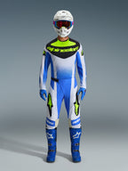 Alpinestars 2026 Techstar Knif Pants, Motocross Pants, Ucla Blue, Black, and Yellow Fluo, part of a full racing gear set with matching jersey, blue boots, blue gloves, and white helmet, athletic race fit with bold Alpinestars branding.