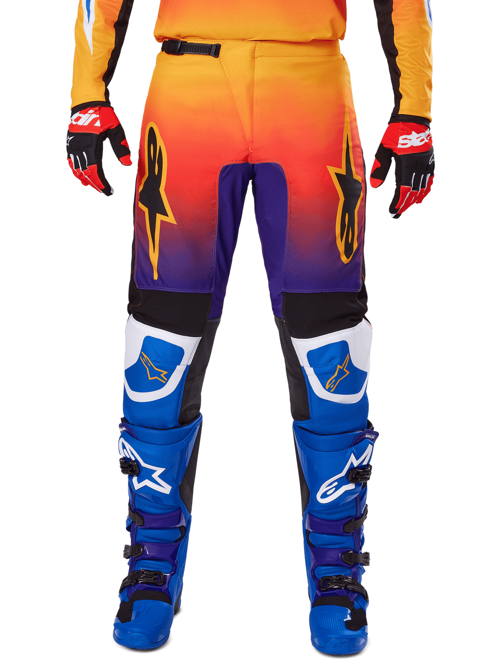 Alpinestars 2025 Fluid Wurx Pants, Motocross Pants, Multicolor featuring orange-to-purple gradient and blue panels, worn with matching blue and purple boots and red and black gloves, front view with star logo branding.