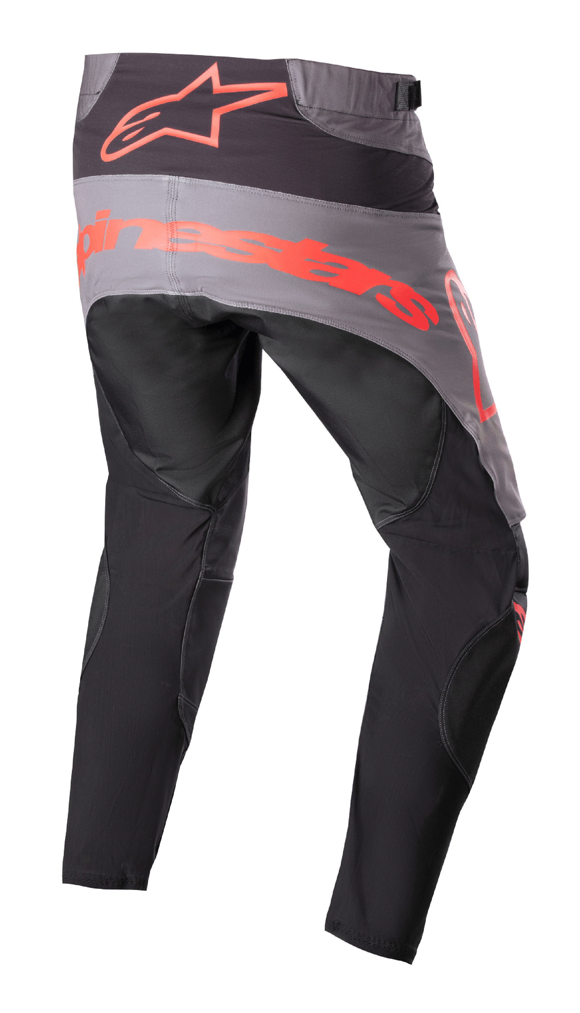 Alpinestars Pantalon Techstar Sein 2023, pantalon de motocross, noir et rouge fluo, vue arrière avec empiècement d'assise gris et logo rouge fluo imposant, jambes pré-courbées ergonomiques, construction textile durable pour la performance tout-terrain.