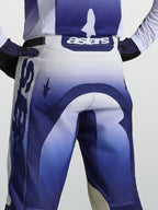 Pantalon Alpinestars Racer Air Amber de motocross, bleu et blanc, vue arrière montrant le logo astars à la taille