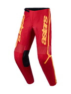 Alpinestars Fluid Apex V2, pantalon de motocross pour homme, rouge et doré, avec renforts 600D et panneaux extensibles.