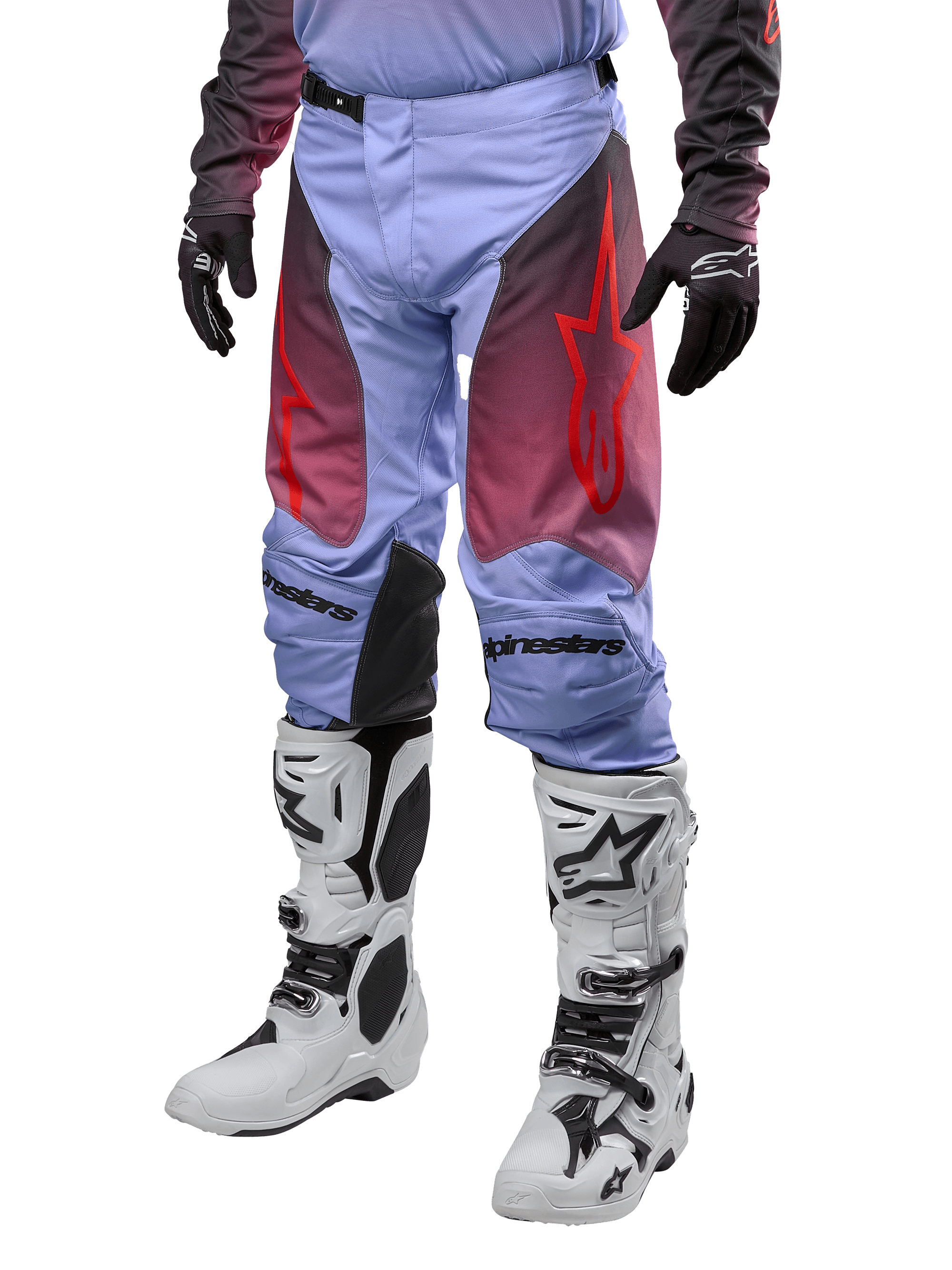 Alpinestars 2024 Racer Hoen Pants, Motocross Pants, Lavan Purple and Black with red graphics, featuring red star logos on the thighs and black lettering on the knees, worn with white and black boots and black gloves