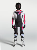 Pantalon Alpinestars Fluid Drag, équipement de motocross pour homme, noir et blanc avec détails rouge fluo, coupe ergonomique et durable pour le pilotage tout-terrain