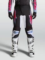 Pantalon Alpinestars Fluid Drag, pantalon de motocross pour homme, noir et rouge, poly-tissu 600D et panneaux stretch.