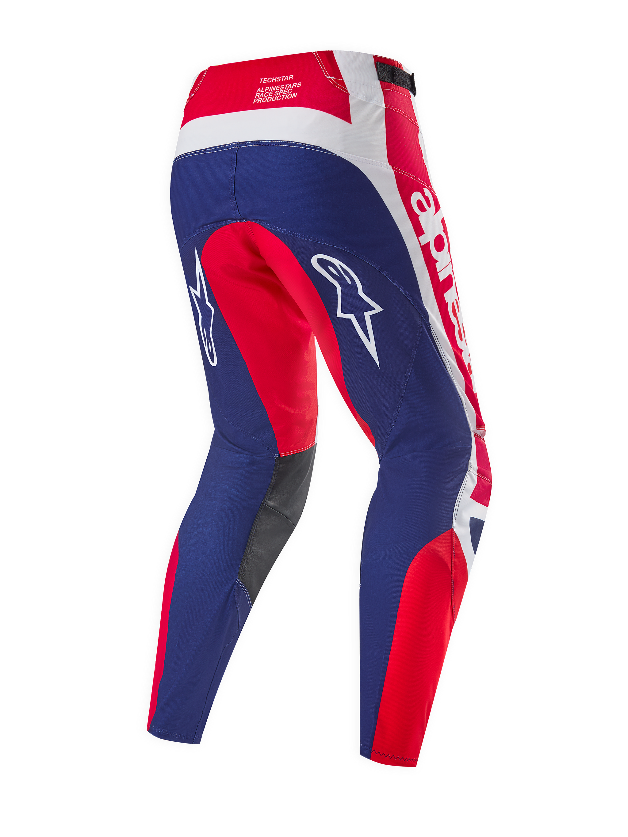 Pantalon Alpinestars Techstar Fortitude Édition Limitée, pantalon de motocross, rouge vif, blanc et bleu, vue arrière mettant en évidence les panneaux de course ergonomiques, les logos Alpinestars blancs et les panneaux intérieurs de genoux gris foncé.