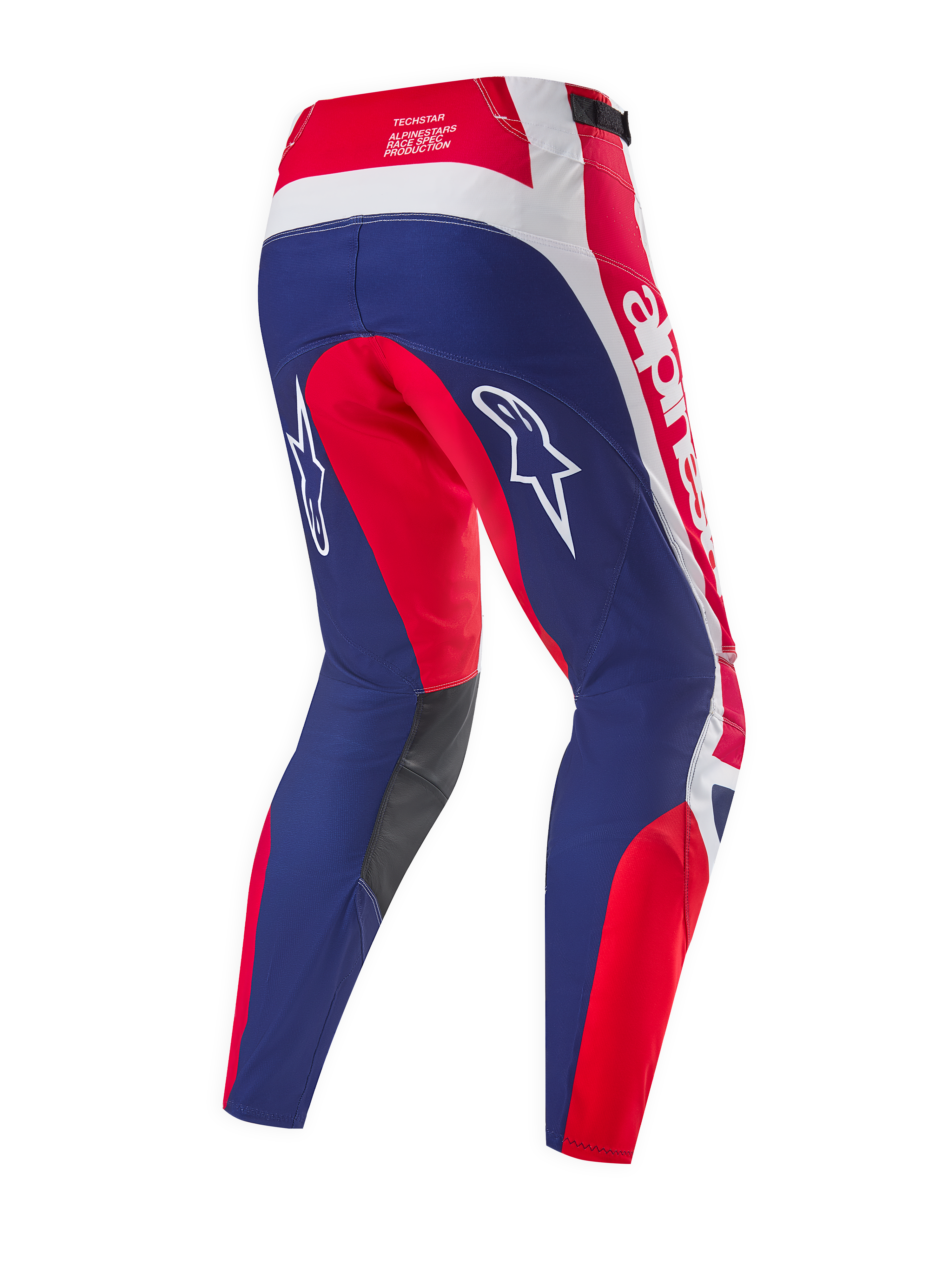 Pantalon Alpinestars Techstar Fortitude Édition Limitée, pantalon de motocross, rouge vif, blanc et bleu, vue arrière mettant en évidence les panneaux de course ergonomiques, les logos Alpinestars blancs et les panneaux intérieurs de genoux gris foncé.