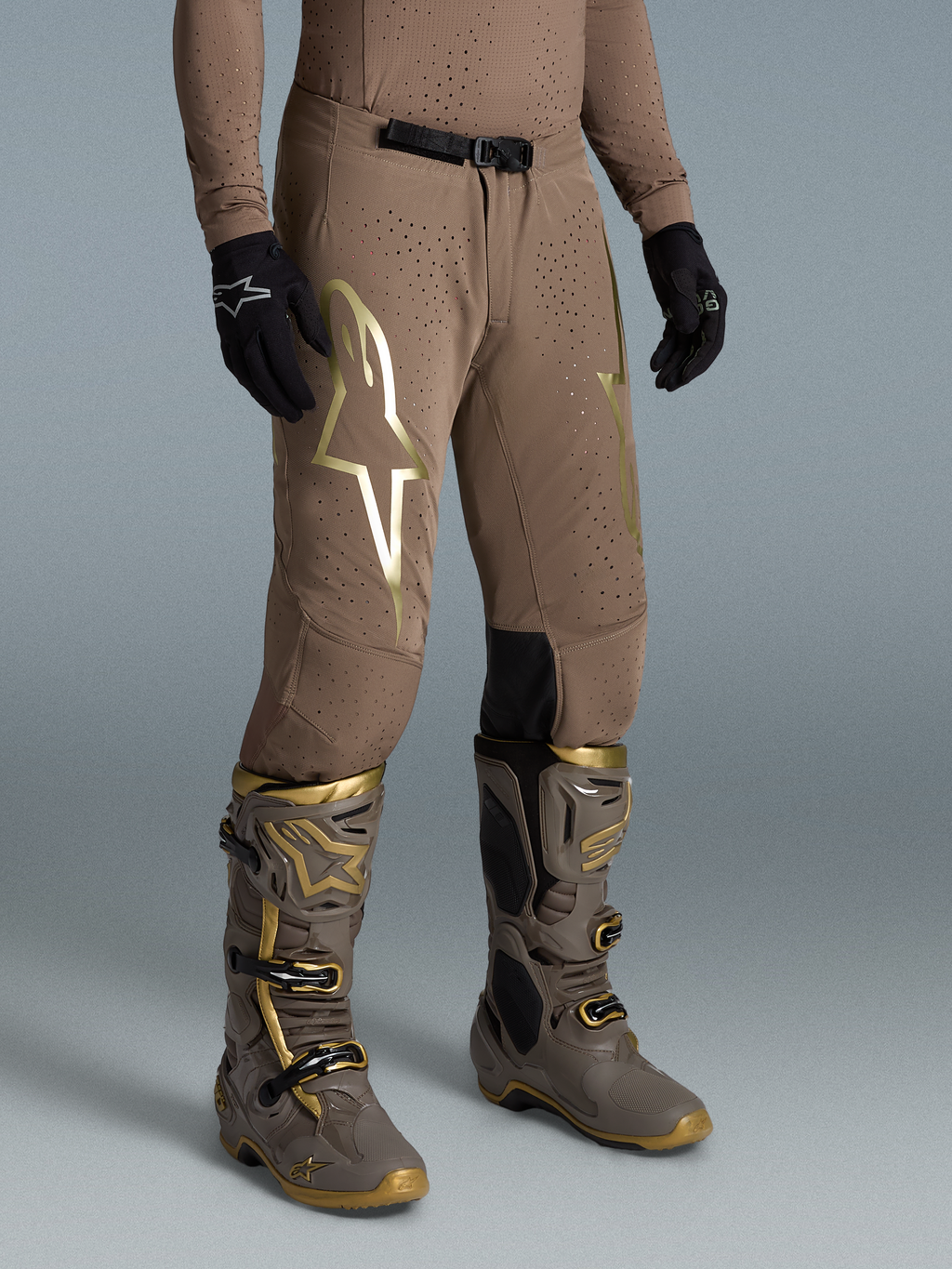 Pantalon Supertech Air Gold Édition Limitée Alpinestars, pantalon de motocross marron et doré en tissu ripstop extensible perforé pour homme.