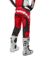 Alpinestars 2024 Techstar Ocuri Pants, Motocross Pants, Mars Red White and Black, back view featuring large white Alpinestars logo on the seat, black mesh ventilation panels, worn with white and black motocross boots, athletic race-fit design for off-road riding