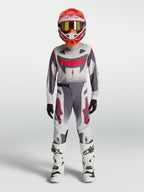 Alpinestars Youth Supertech Swan Pants, gray and red fluo motocross racing gear, youth gear set, performance athletic fit.