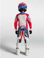 Pantalon Alpinestars Supertech Dyna Junior, équipement de motocross pour enfant, rouge et bleu marine, vue de dos.