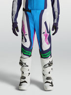 Alpinestars Youth Supertech Maven Pants, white and blue motocross gear with fluo green accents and athletic performance fit.