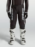 Pantalon Alpinestars Fluid Apex V2 Junior, pantalon de motocross noir et argenté, jambes préformées ergonomiques pour enfant