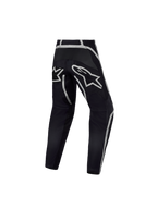 Pantalon Alpinestars Fluid Apex V2 Junior, pantalon de motocross tout-terrain, noir et argenté, vue de dos montrant la construction ergonomique haute performance