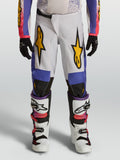 Alpinestars Pantalon Fluid Drag Junior, pantalon de motocross blanc et bleu avec graphismes dorés, coupe ergonomique tout-terrain