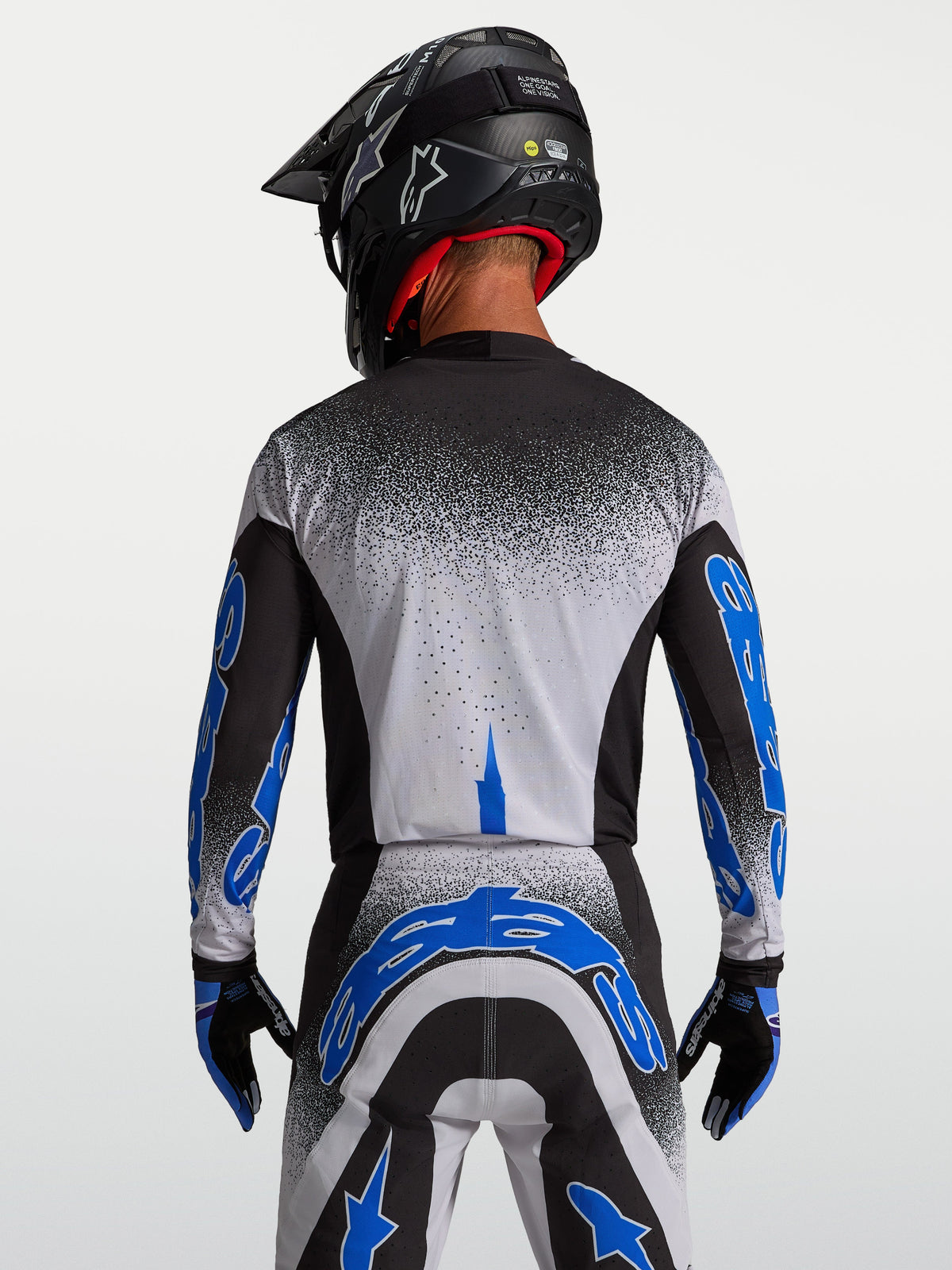 Maillot Alpinestars Supertech Hiten AFD, maillot de motocross pour homme, noir et bleu clair, vue de dos, coupe athlétique